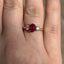Oval Cut Ruby & Round Brilliant Cut Diamond Trilogy Engagement Ring