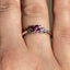 Round Brilliant Cut Pink Sapphire with Pear Cut Diamond Side Stones Trilogy Ring