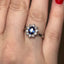 Oval Cut Sapphire With Round Brilliant Cut Diamond Cluster
