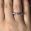 Round Brilliant Cut 0.91ct Diamond Crossover 9 Stone Eternity Ring