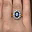 Oval Cut Sapphire with Round Brilliant Cut Diamond Cluster