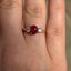 Oval Cut Ruby & Round Brilliant Cut Diamond Trilogy Engagement Ring