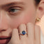 Oval Cut Sapphire with Pear Cut Diamond Side Stones Trilogy Ring