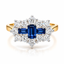 Baguette Cut Sapphires with Round Brilliant Cut Diamond Cluster