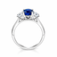Oval Cut Sapphire with Round Brilliant Cut Diamond Side Stones Trilogy Ring