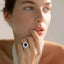 Oval Cut Sapphire with Round Brilliant Cut Diamond Cluster