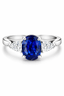 Oval Cut Sapphire with Pear Cut Diamond Side Stones Trilogy Ring