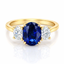 Oval Cut Sapphire with Oval Cut Diamond Side Stones Trilogy Ring