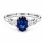 Oval Cut Sapphire with Pear Cut Diamond Side Stones Trilogy Ring