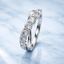 Round Brilliant Cut 0.91ct Diamond Crossover 9 Stone Eternity Ring