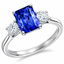 Emerald Cut Tanzanite With Round Brilliant Cut Diamond Side Stones