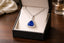 Triangle Cut Tanzanite With Diamond Halo Pendant