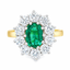 Oval Cut Emerald & Round Brilliant Cut Diamond Cluster Engagement Ring