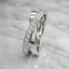 Round Brilliant Cut 0.25ct Diamond Crossover Eternity Ring