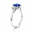 Cushion Cut Sapphire with Round Brilliant Cut Diamond Side Stones Trilogy Ring