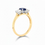 Oval Cut Sapphire with Round Brilliant Cut Diamond Side Stones Trilogy Ring