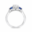 Round Brilliant Cut Diamond with Pear Cut Sapphire Side Stones Trilogy Ring