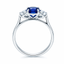 Cushion Cut Sapphire with Round Brilliant Cut Diamond Side Stones Trilogy Ring