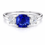 Cushion Cut Sapphire with Round Brilliant Cut Diamond Side Stones Trilogy Ring